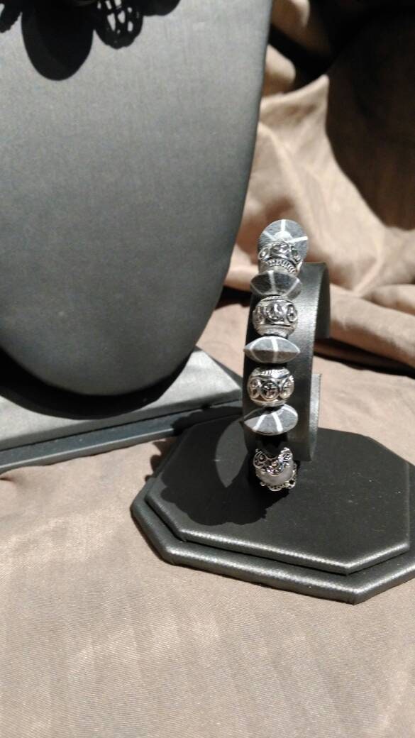 Bone.    Black, Gray & Silver 3 piece jewelry suite