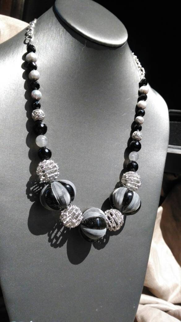Bone.    Black, Gray & Silver 3 piece jewelry suite