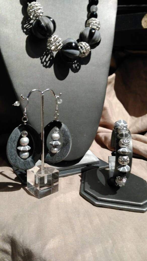 Bone.    Black, Gray & Silver 3 piece jewelry suite